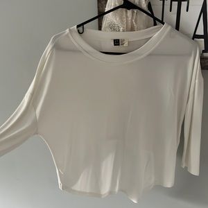 Lira long sleeve white shirt, super soft and shorter in back! See pics
